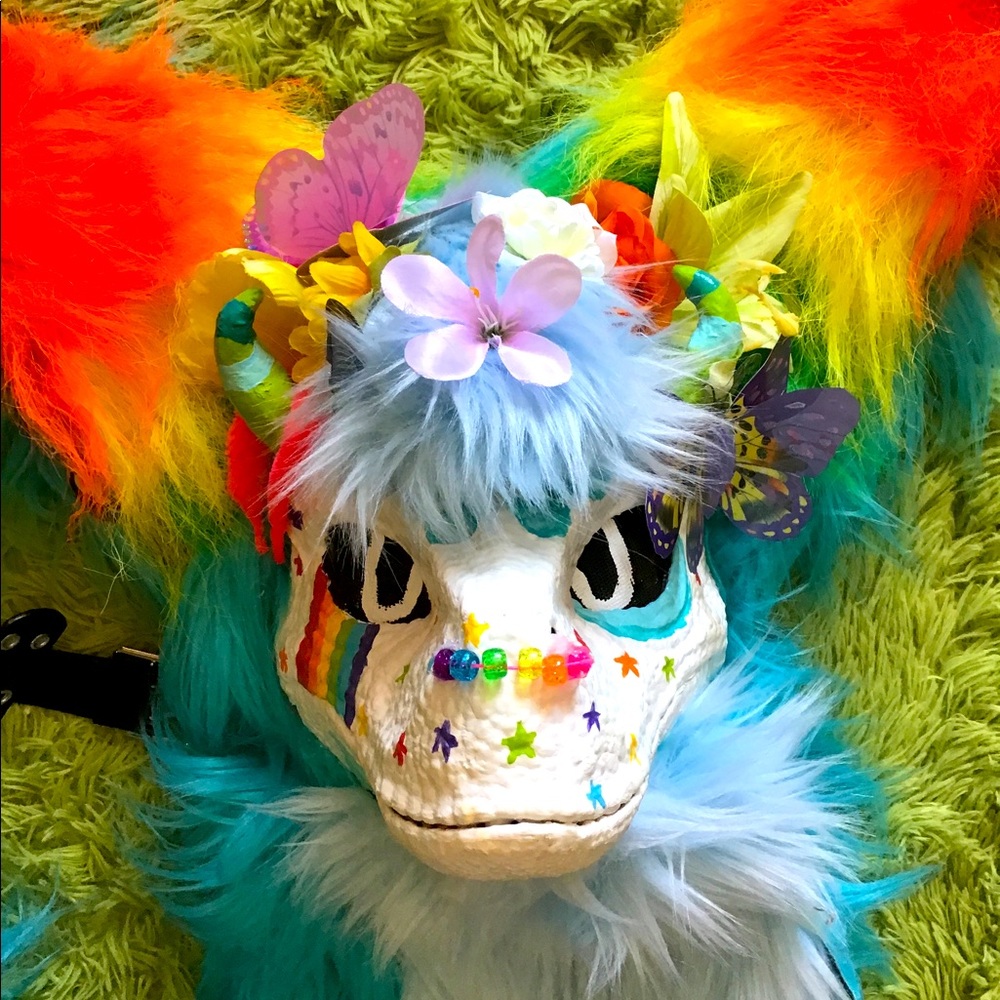 A fixer upper but still wearable and usable comes with tail, head, and art! :)